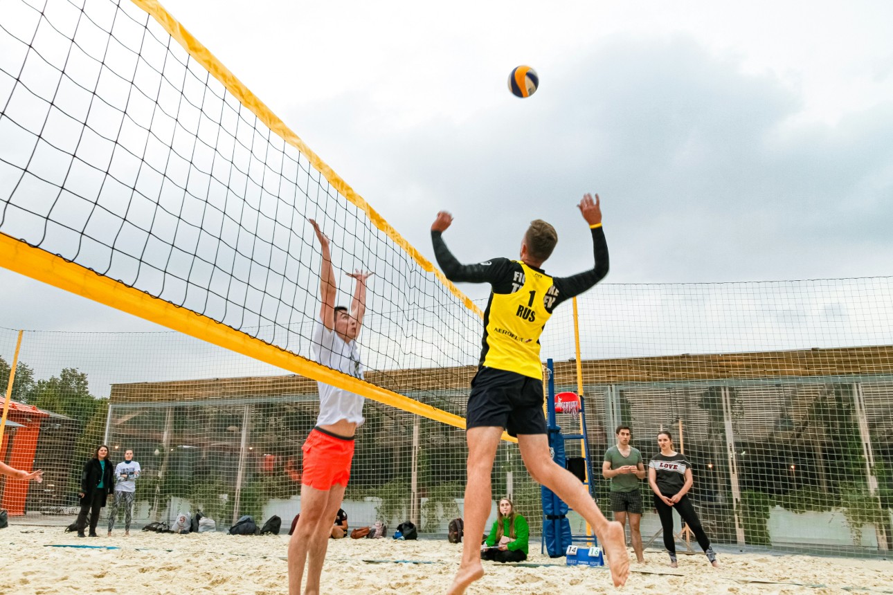Beach volleyball match in action