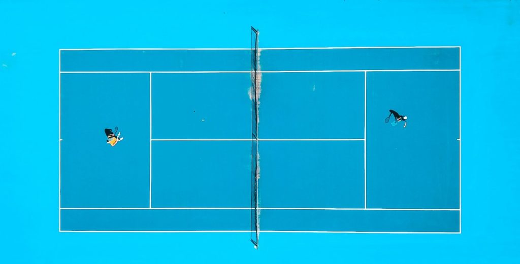 Two players on tennis court