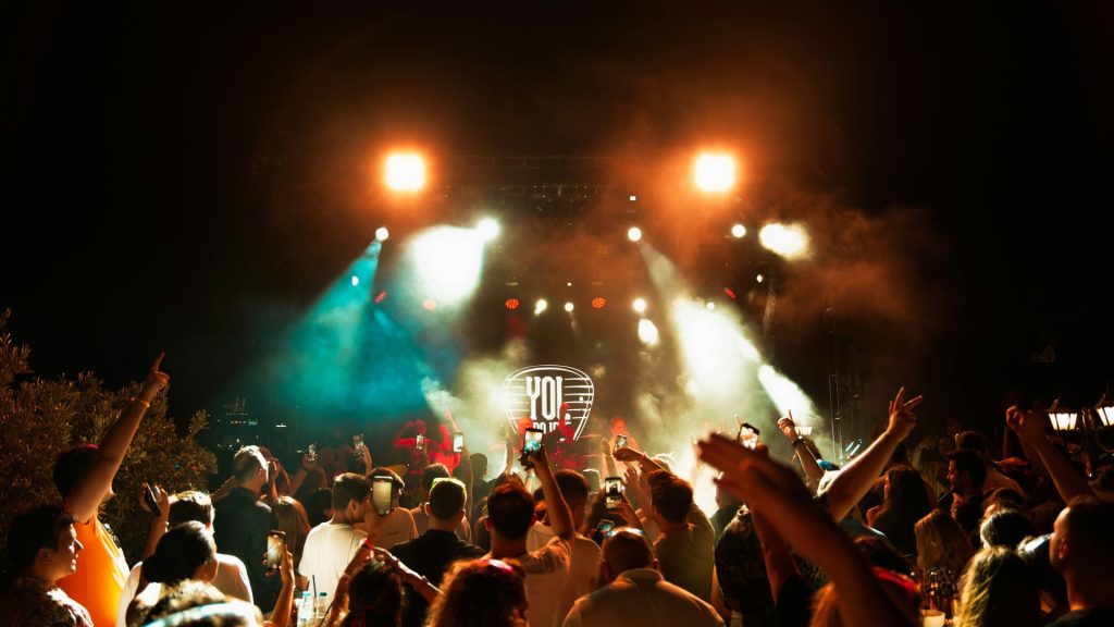 Outdoor music festival crowd enjoying live performance